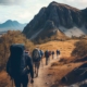 hiking men walking towards mountain - the path